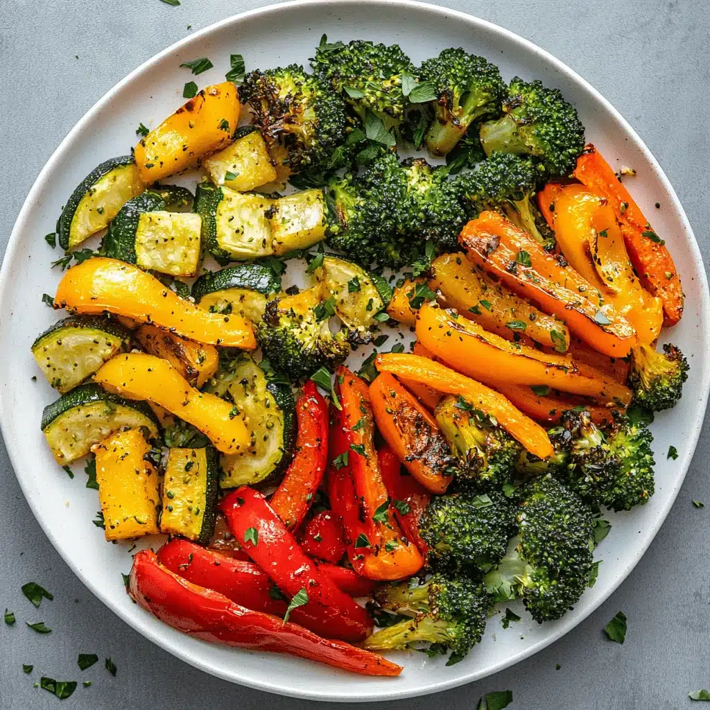 Airfried mixed vegetables with herbs on a white plate