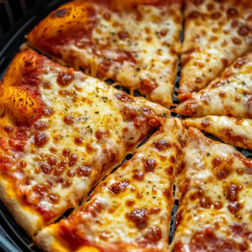 crispy air fryer frozen pizza inside air fryer basket