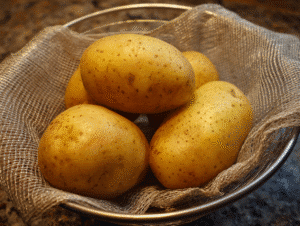 Scrub potatoes clean and dry thoroughly. Moisture prevents crisping.