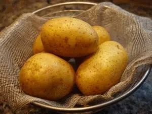 Scrub potatoes clean and dry thoroughly. Moisture prevents crisping.